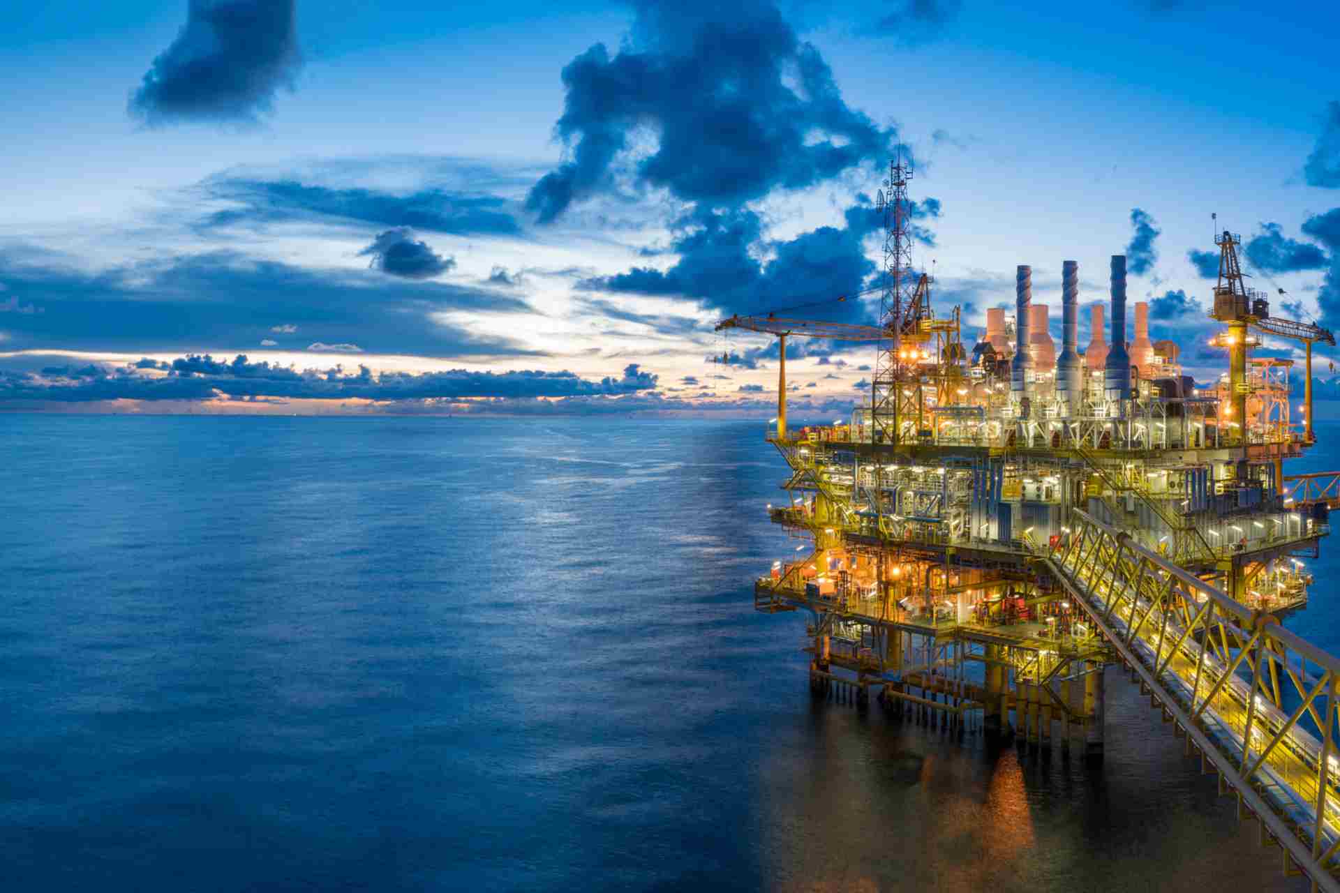 background image oil rig at dusk